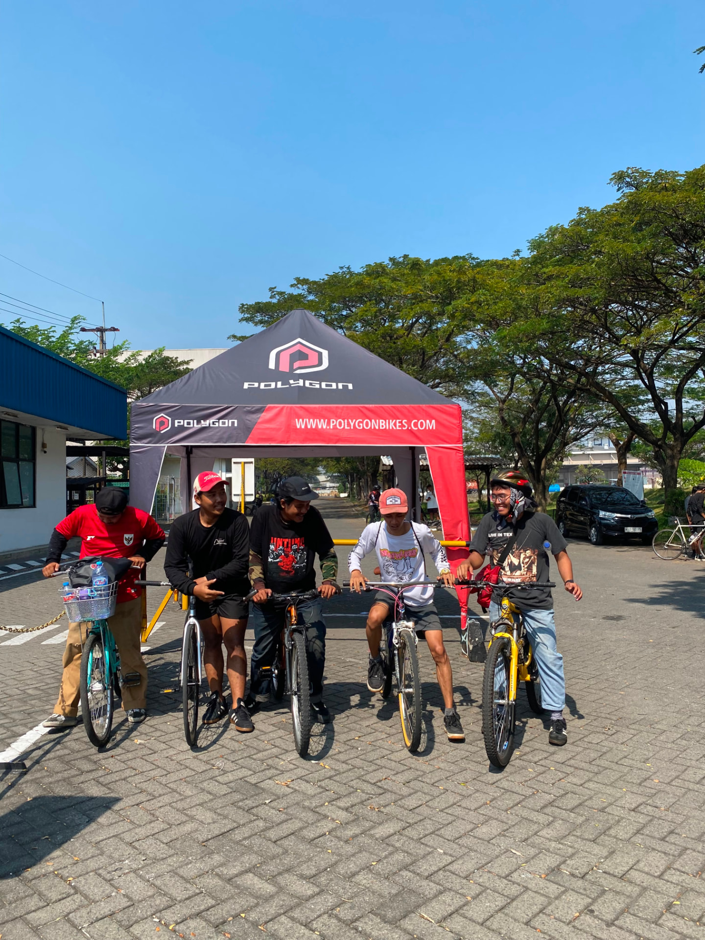 Riders rolling out from the gate at the start of the ride